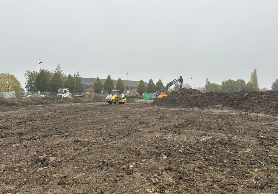 STP Construction team working at Marrtree Business Park. Grey sky with groundworks in progress. 